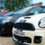 Row of used cars for sale in the USA with CarWale.us branding